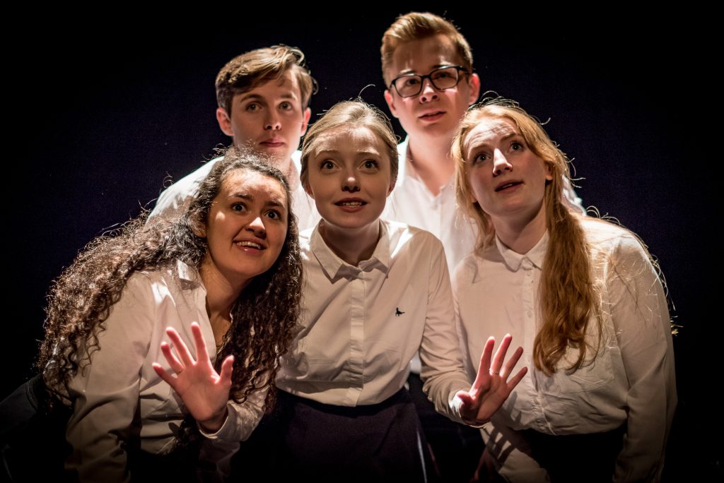 A group of youth theatre performers