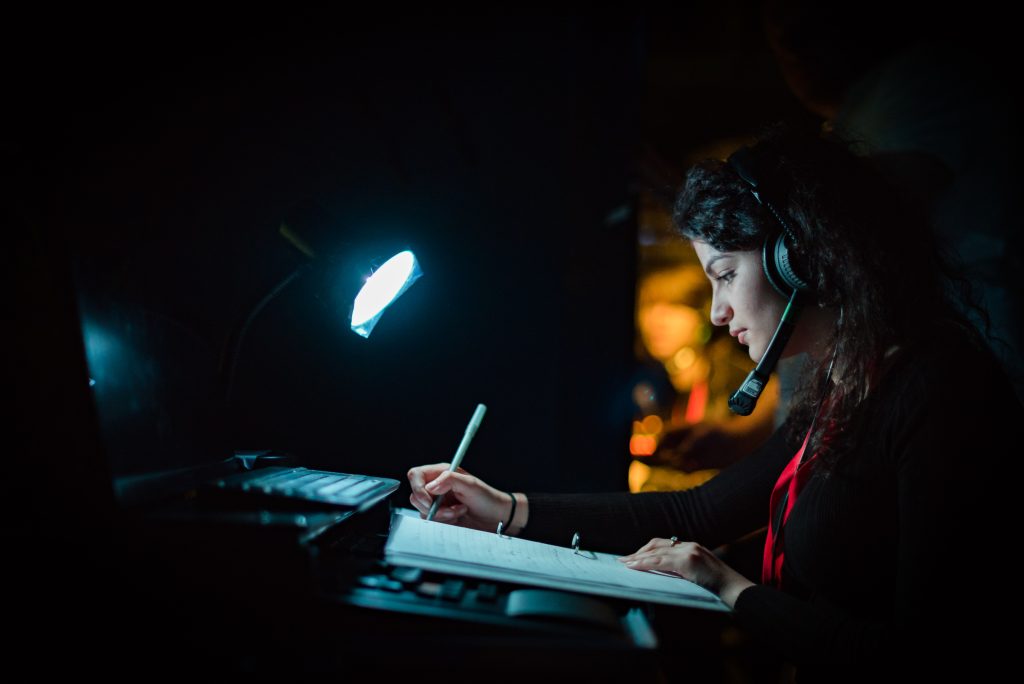 A theatre practitioner working backstage